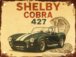 Vintage-style aluminium tin sign featuring a classic Shelby Cobra 427 sports car with the iconic cobra emblem on a distressed retro background.