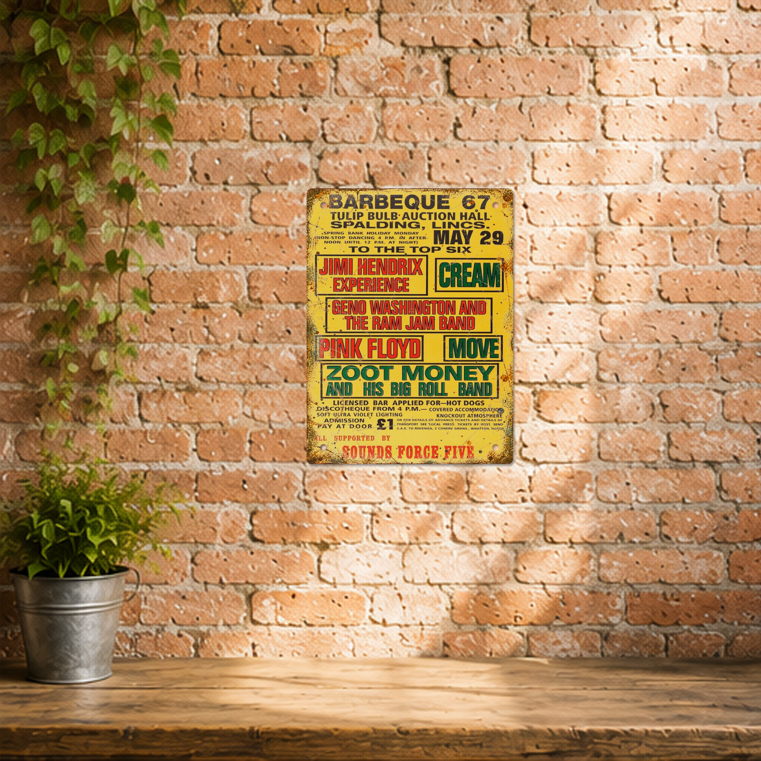 Barbeque '67 Spalding festival tribute tin sign displayed on a rustic brick wall